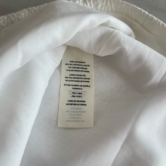 Alice and Olivia Size 2 drop waist short sleeve white dress. - Picture 3 of 3